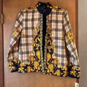 Pleat Pleat By Rafael Zip up jacket.